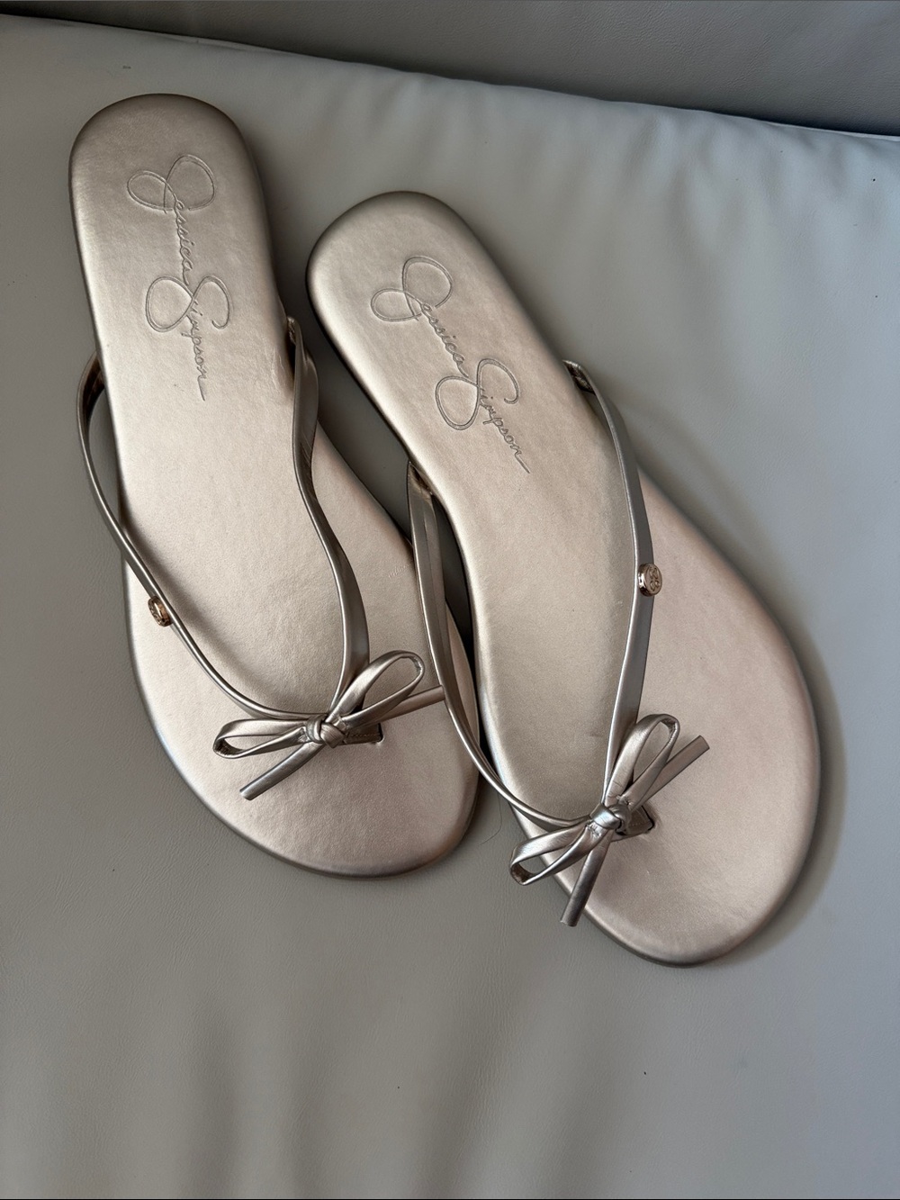 Jessica Simpson Metallic Bow Thong Sandals - Rose Gold